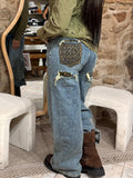 Jeans tasca animalier